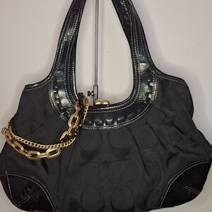 "2000s" Coach Signature Canvas Ergo Kiss Lock leather handbag